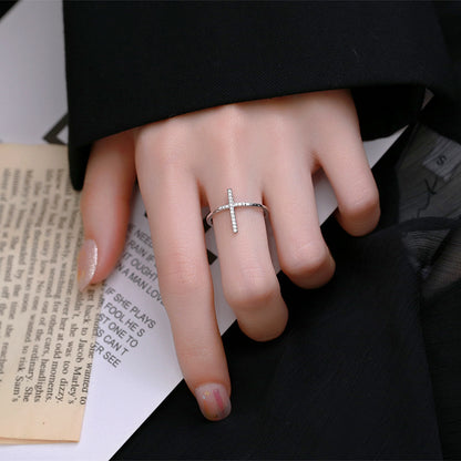 woman silver cross ring 