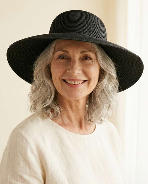 Alassio Wide-Brim Sun Hat worn by a model