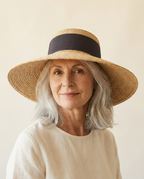 Positano Ribbon Straw Hat worn by a model